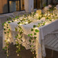Guirlande lumineuse LED en fil de cuivre avec fleurs artificielles Industris.fr